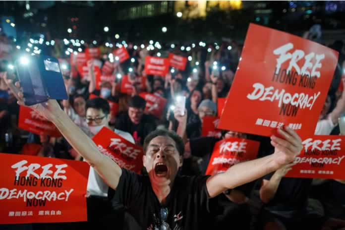 518INT- China. La reforma electoral de Hong Kong protegerá el rol de la región a nivel internacional argumenta Xi jinping